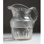 A GOOD VICTORIAN CUT GLASS JUG. 7.25ins high.