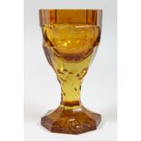 A GOOD BOHEMIAN AMBER OCTAGONAL GOBLET. 6ins high.