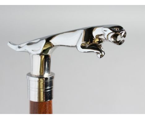 A WALKING STICK with CHROME JAGUAR handle.