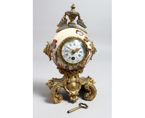 A GOOD 19TH CENTURY FRENCH PORCELAIN AND ORMOLU SMALL MANTLE CLOCK with urn finial, enamel dial with Arabic and Roman numeral