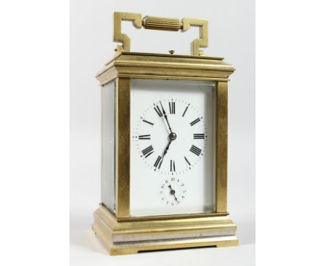 A GOOD BRASS CARRIAGE CLOCK with repeat action. 6ins high.