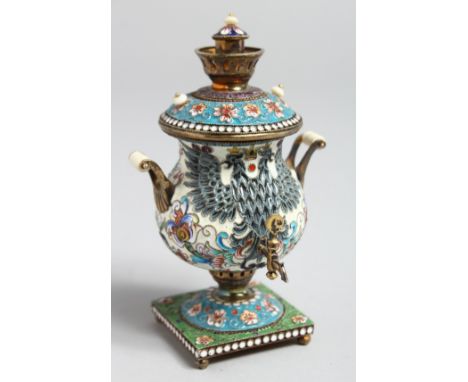 A SMALL RUSSIAN SILVER AND ENAMEL SAMOVAR AND COVER with handles and tap on a square base with three ball feet, 9cm high, mar