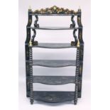 A GOOD 19TH CENTURY CHINNOISERE DECORATED SIX TIER BACK LACQUER WHAT NOT of serpentine outline, each