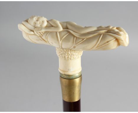 A WALKING STICK with carved bone handle of a nude