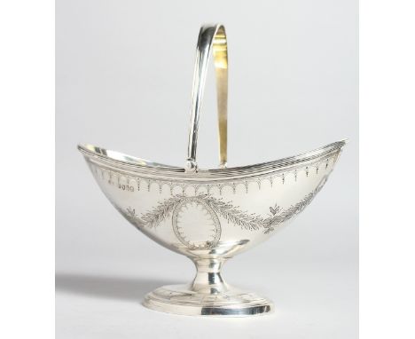 A GOOD VICTORIAN GEORGIAN SHAPED SUGAR BASIN with swivel handle and engraved garlands. London 1784.  Maker H. W.