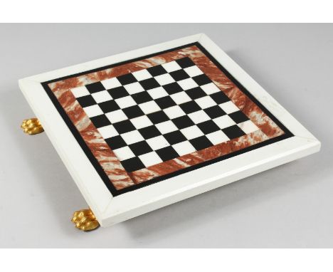 A MARBLE INLAID CHESS BOARD on four claw feet. 13ins