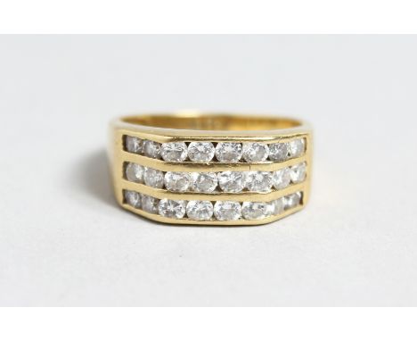 A 9CT GOLD THREE ROW DIAMOND RING.