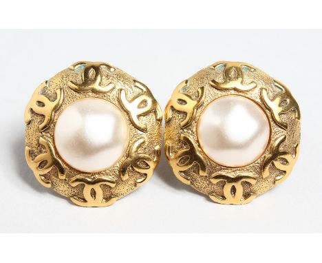 A PAIR OF CHANEL GILT AND MOTHER OF PEARL EAR CLIPS, No. 2908.