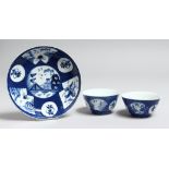 TWO BOW POWDER BLUE TEA BOWLS AND A SAUCER with Chinese vignettes.