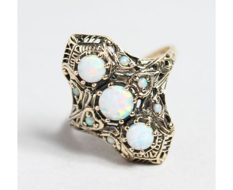 A 9CT GOLD OPAL SET RING.