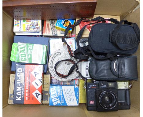 A collection of playing cards and games, cribbage board, three cameras and a Panini Super Auto album, incomplete **PLEASE NOT