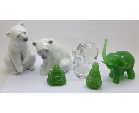 Two Lladro seated polar bear figures, a Wedgwood glass bird, a glass elephant, a jade elephant, Buddha and one other figure, 
