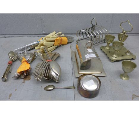 A Victorian silver fork and a collection of plated ware; spoons, egg cruet, toast rack, butter dish, flatware**PLEASE NOTE TH