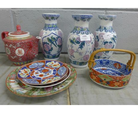 Oriental china including three vases, three plates, a bowl and a teapot **PLEASE NOTE THIS LOT IS NOT ELIGIBLE FOR POSTING AN