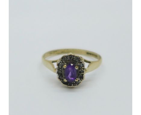 A 9ct gold, amethyst and diamond cluster ring, 1.3g, L/M 