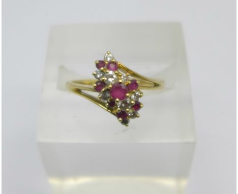 An 18ct gold, ruby and diamond ring, 3.6g, P 