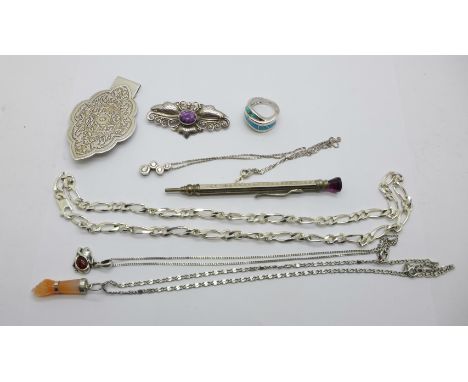 Four silver chains, three pendants, a 925 silver and synthetic opal ring, a white metal brooch, a 925 silver clip and a penci