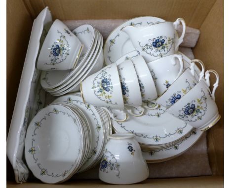 An Argyle pattern bone china tea and dinner service **PLEASE NOTE THIS LOT IS NOT ELIGIBLE FOR POSTING AND PACKING** 