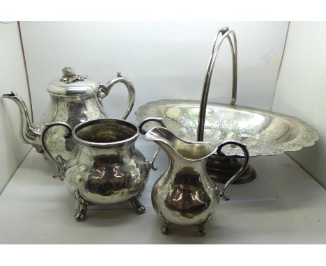 A three piece plated tea service and a basket 
