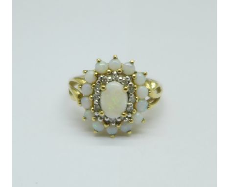 A 9ct gold, opal and diamond cluster ring, 3.1g, P 