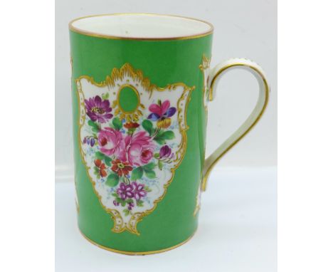A Dresden hand painted mug decorated with bouquets of flowers 