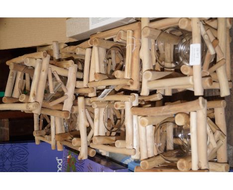 Nine driftwood framed tea light holders