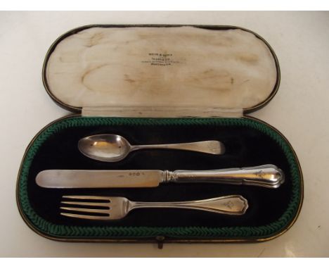 Cased silver knife, fork and spoon set (spoon unassociated)