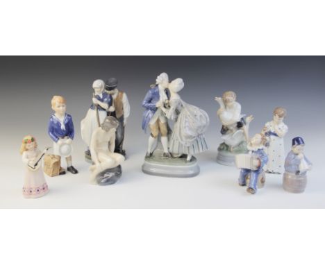 A Royal Copenhagen figural group, 20th century, modelled as an 18th century courting couple, model number 2046, printed maker