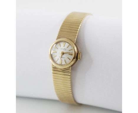 A lady's vintage Majex 9ct gold 21 jewels incabloc wristwatch, round cream dial with gold toned baton markers, case size 17mm