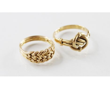 An Edwardian 18ct gold knot design ring, marks for Chester 1908, size O ½, together with a late Victorian 18ct gold braided r