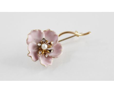 A French pearl and diamond set glazed ceramic cherry blossom brooch, comprising a central round cultured pearl with a surroun