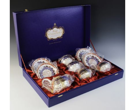 A Royal Crown Derby tête-à-tête novelty tea service, in the Imari palette, the teapot, sucrier and milk jug each modelled as 