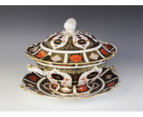 A large Royal Crown Derby Imari, 1128 pattern tureen, cover and stand (at fault) (seconds), tureen 31cm wide, stand 37cm wide