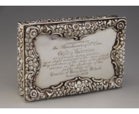 A William IV silver table snuff box, Nathaniel Mills, Birmingham 1838, of rectangular form with cushion sides, embossed folia