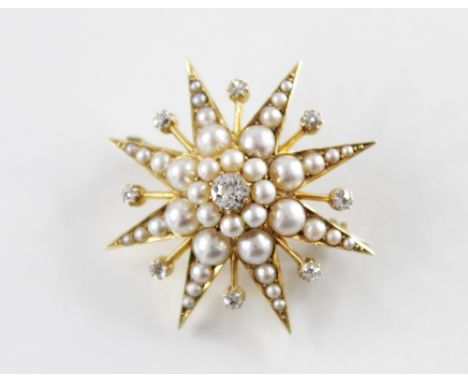 A diamond and cultured pearl star-burst brooch, the central old cut diamond within a surround of graduated half pearls and sm