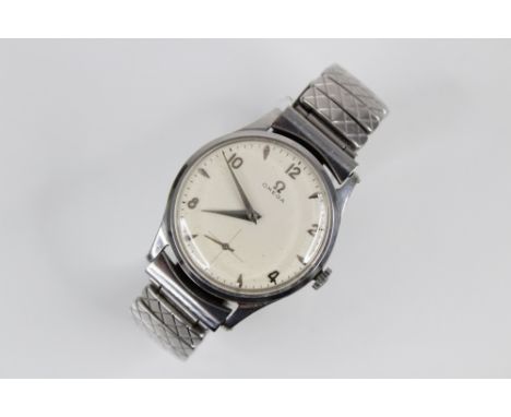 A gentleman's vintage Omega stainless steel wristwatch, the circular cream dial Arabic numerals and baton markers, subsidiary