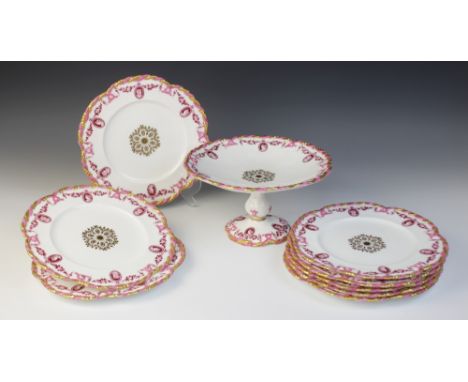 A Coalport dessert service, late 19th century, comprising a comport and eight plates, each piece with gilt floral and foliate