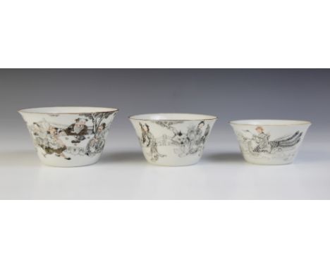 A set of three Chinese porcelain stacking cups, Daoguang seal mark, each of tapered cylindrical form and externally decorated