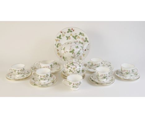 A Wedgwood six place tea service in the 'Wild Strawberry' pattern (R4406), comprising: a teapot and cover, a milk jug, a sucr