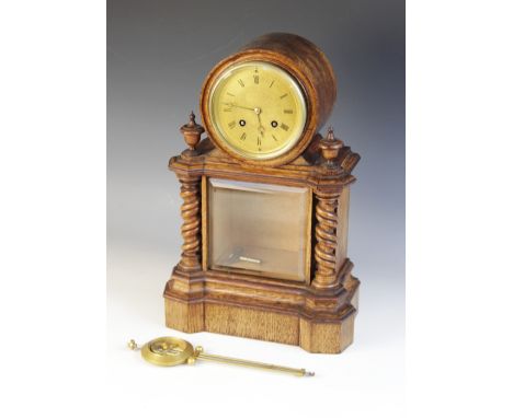 A late 19th century golden oak drum dial mantel clock, the 12cm gilt metal dial and two train movement stamped '13521' striki