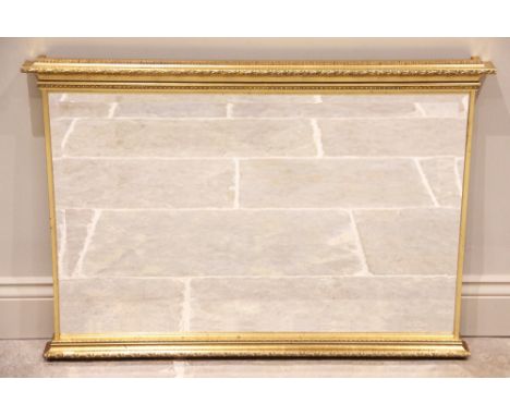 A 19th century style giltwood wall mirror, late 20th/early 21st century, the rectangular bevelled mirrored plate within a rel