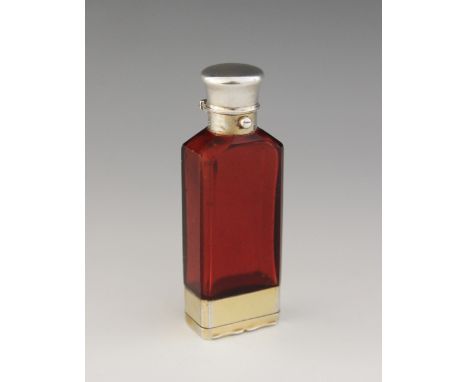 A Victorian silver gilt ruby glass scent bottle cum vinaigrette, Sampson Mordan, London 1865, faceted oblong glass body, the 