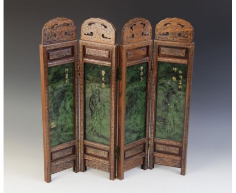 A Chinese Nephrite Jade inset table screen, the four-fold screen set with spinach jade panels, each signed in gilt and carved
