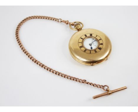 An early 20th century 18ct gold half hunter pocket watch, London 1925, circular white dial with Roman numeral markers and sub