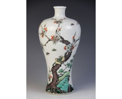 A Chinese porcelain vase, late 19th/early 20th century, Kangxi style, the meiping shaped vase decorated in a famille verte co