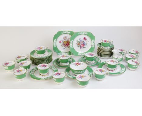 A Spode part tea service, comprising: seventeen spur handled teacups, fourteen saucers, a milk jug, a sugar bowl, twelve side