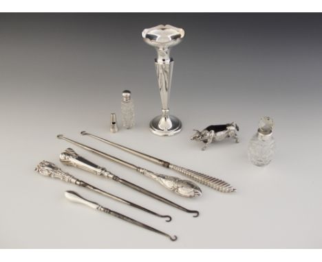 A selection of dressing tableware, to include a George V silver weighted posy vase, Robert Pringle &amp; Sons, Chester 1929, 