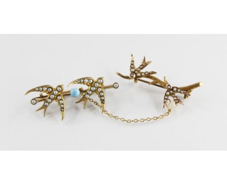 A Victorian seed pearl set swallow brooch, designed as a realistically modelled tree branch surmounted by two swallows with s