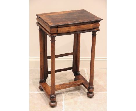 A Williams IV rosewood work table, the rectangular top above a front cushion frieze drawer and a sliding rear panel (lacking 