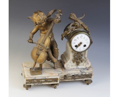 A late 19th century French mantel clock, the marble plinth base surmounted with a gilt metal figure of a cherub playing a cel